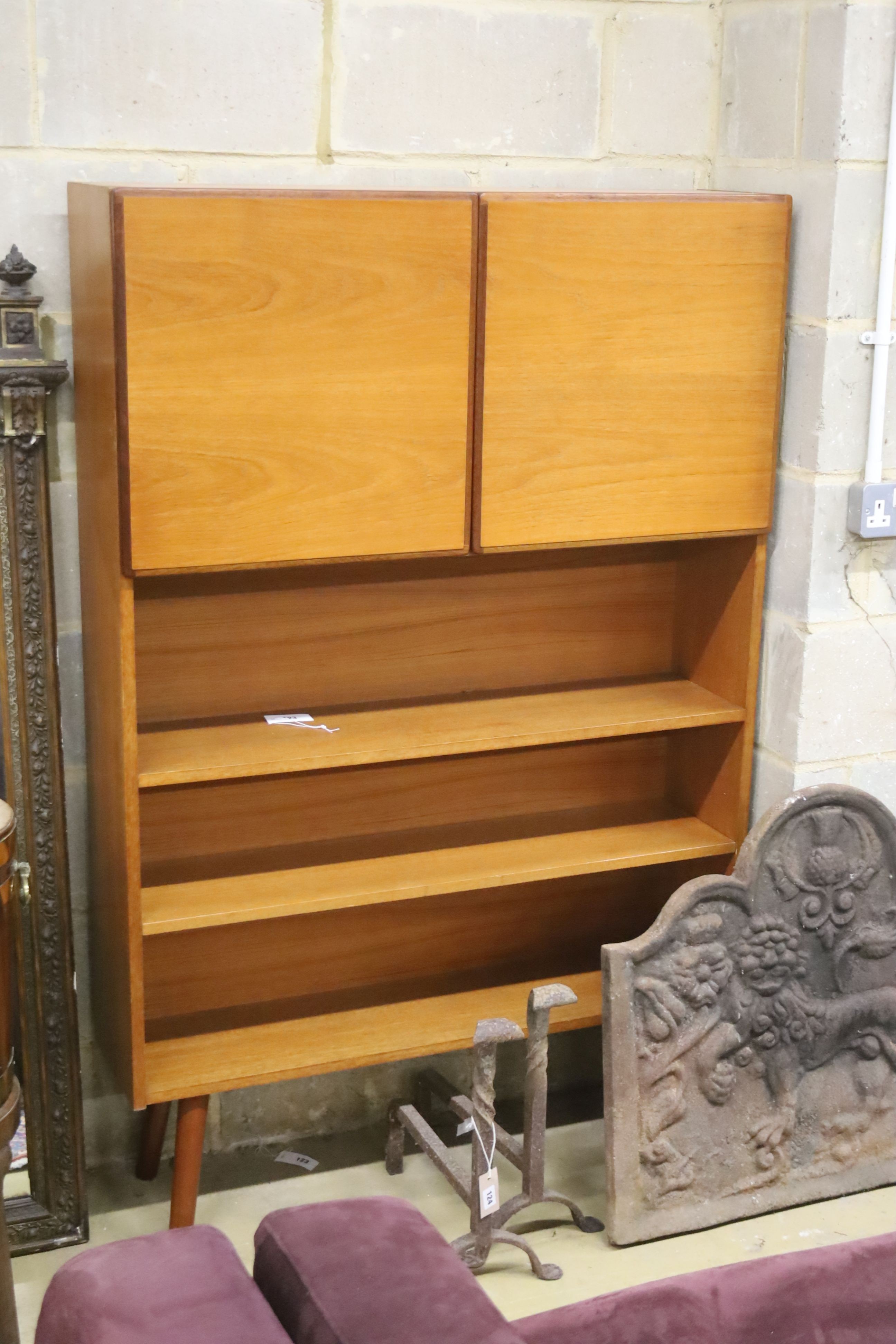 A mid century style teak two door side cabinet, width 102cm, depth 26cm, height 156cm